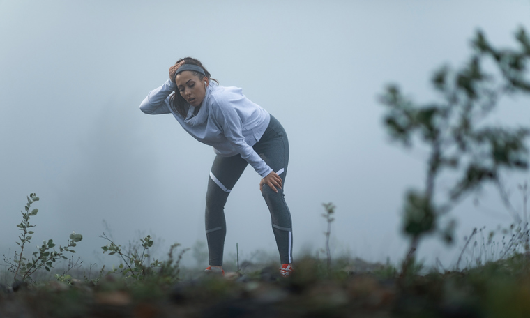 Why can winning create pressure for runners?