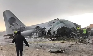 Transport plane carrying money crashes, 15 dead