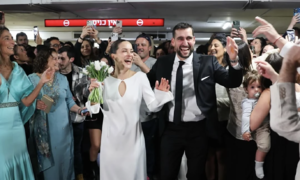A wedding in a parking garage basement in Tel Aviv