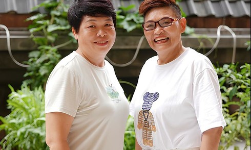 Two women pool resources to buy a home, live together after divorce