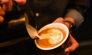 Does drinking coffee with added sugar and fatty cream harm the liver?