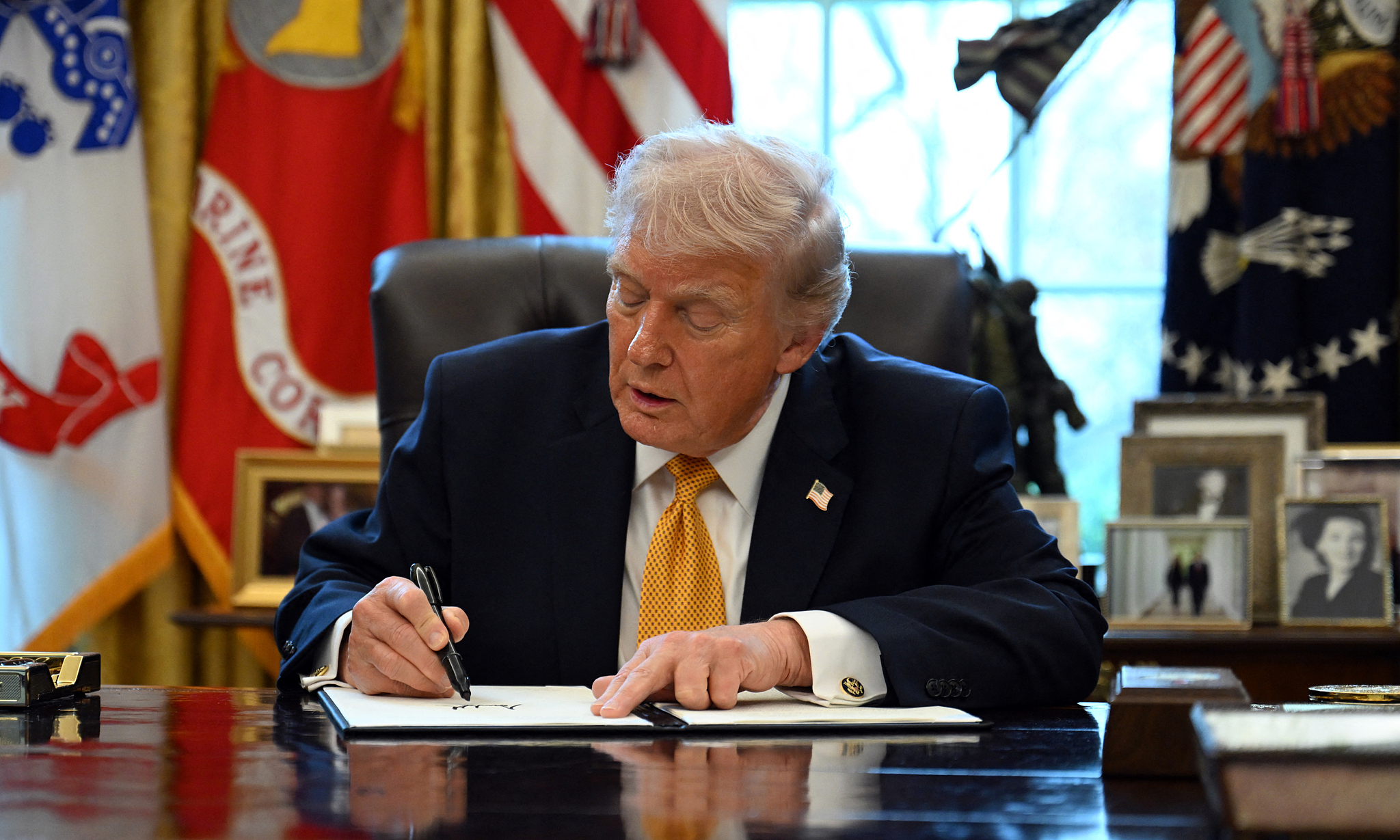 Trump temporarily lifts 'century-old maritime law' to ease Iran conflict impact