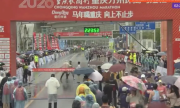 Chinese runner stopped just before finish line while leading