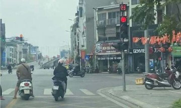 Conflicting traffic light and road markings: which rule applies?