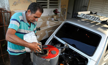 Cuban man converts car engine to run on charcoal