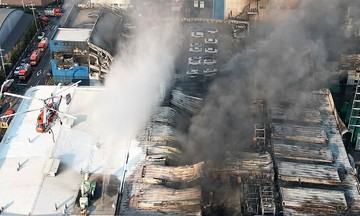 Large fire at auto parts factory, 14 people missing