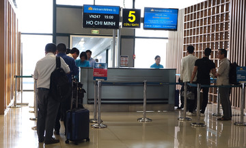 Why do passengers have to change boarding gates at the last minute?