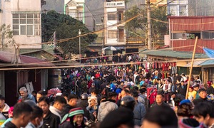 Tourists and locals flock to Dong Van Old Quarter's bustling weekend market