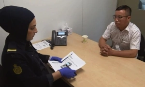 Australian visa canceled due to phone messages