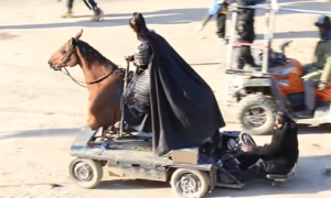 Behind the scenes of a general riding a horse in a historical drama