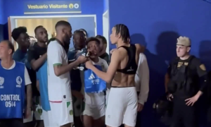 Opposing players vie for Messi's jersey