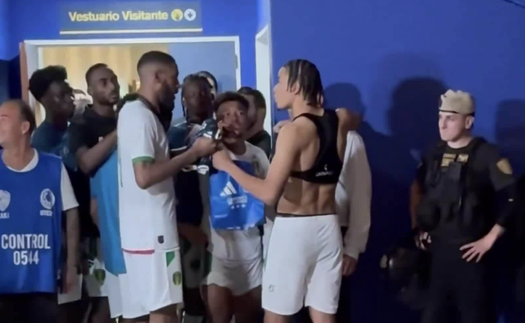 Opposing players vie for Messi's jersey