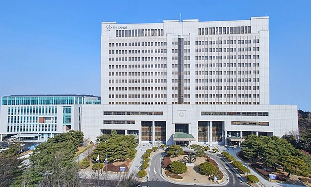 Coach in South Korea convicted of abuse for pinching student's cheek