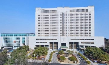 Coach in South Korea convicted of abuse for pinching student's cheek