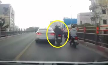 Young rider causes incident by reckless swerving on motorcycle