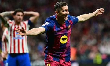 Barca defeats Atletico, extends lead over Real