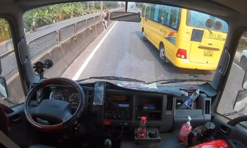 Driver stops vehicle on national highway, carries girl across road