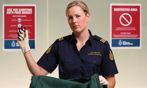 Does limited English lead to airport customs checking phones?