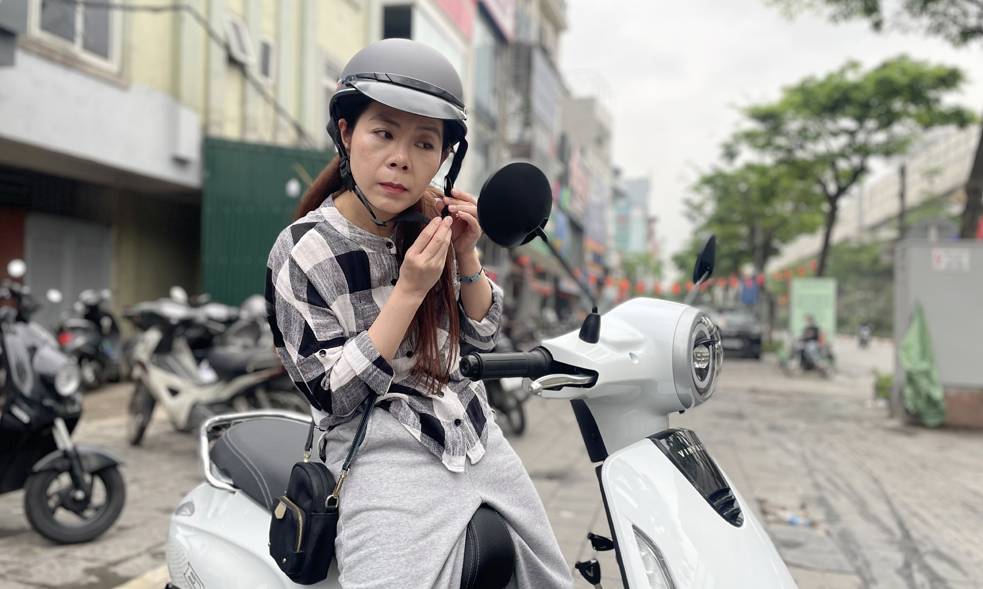 Hanoi families embrace electric motorbikes amid impending petrol ban