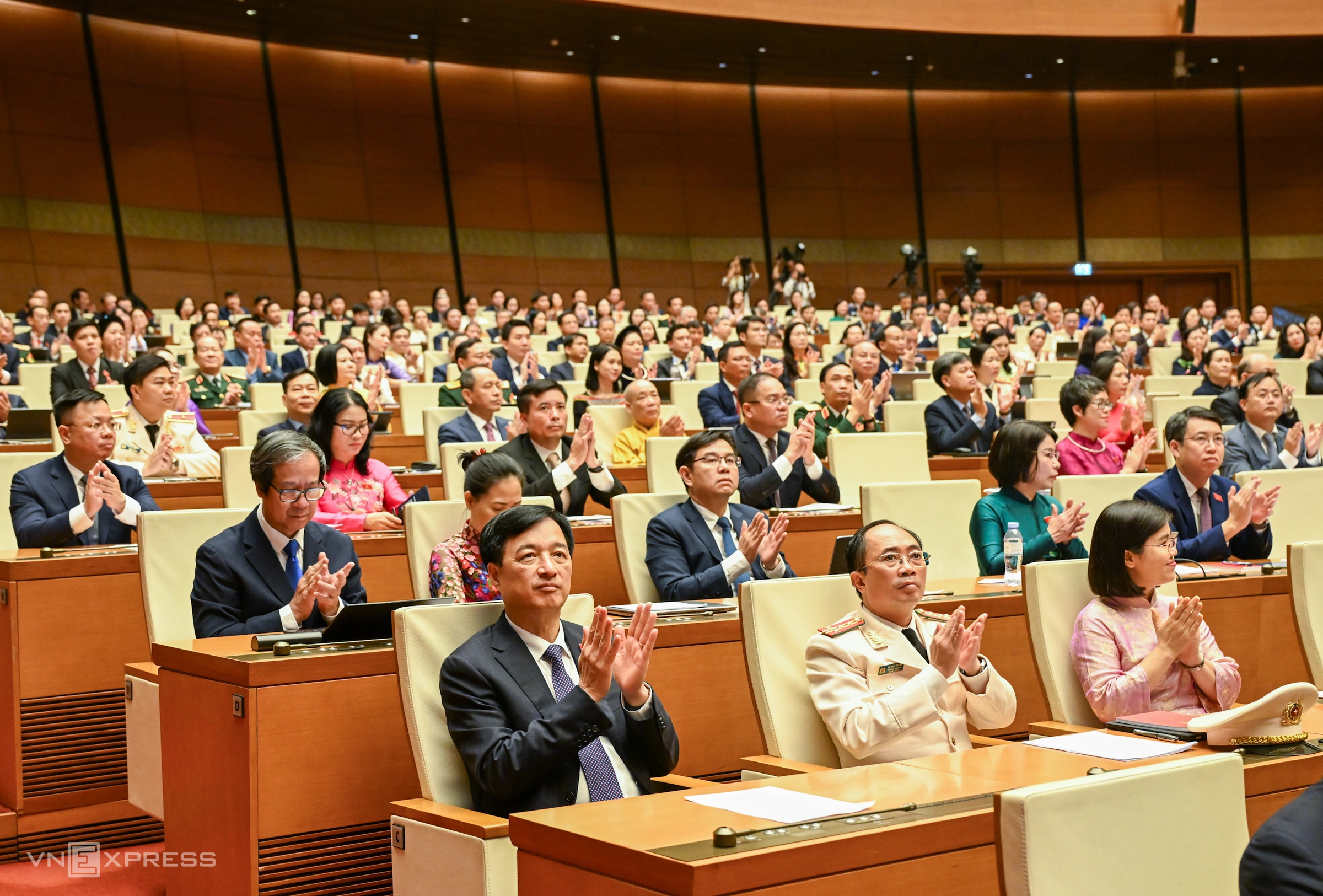 Delegates attend the first session of the 16th National Assembly