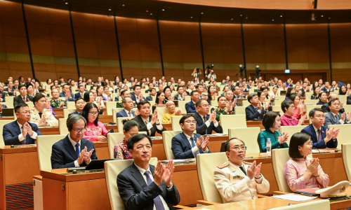 Delegates attend the first session of the 16th National Assembly