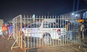 Cambodia investigates group using iron fences to surround police car