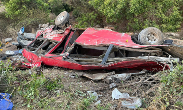 Scene of 28-seat passenger bus falling into ravine, killing four