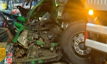 Taxi carrying ba people crushed by truck, driver dies