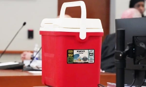 U.S. police officer jailed for throwing cooler at fleeing suspect