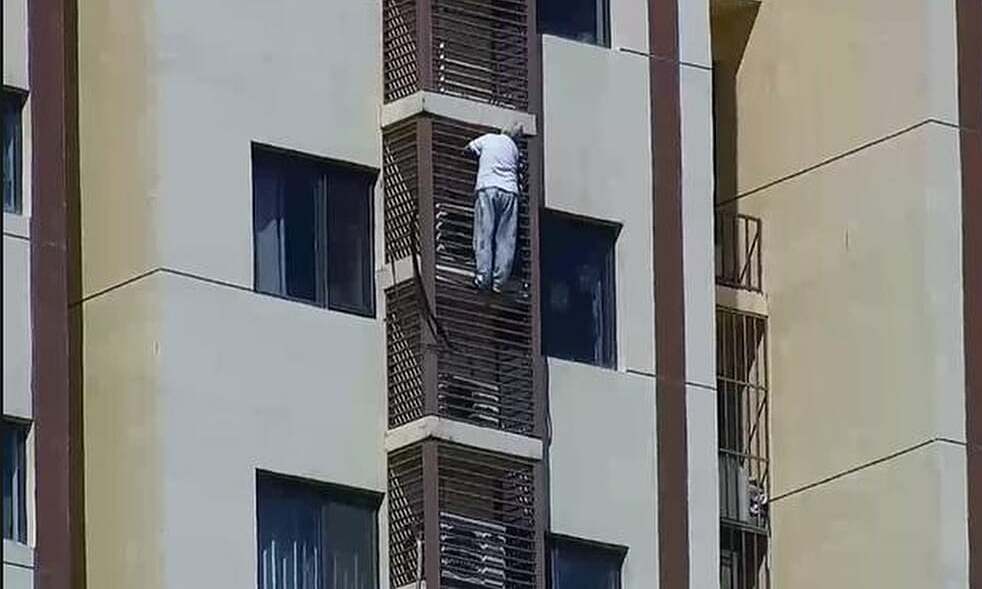 Trapped in room, 89-year-old woman climbs down from 27th to 21st floor