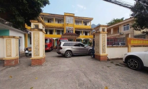 Driver charged after blocking traffic police headquarters entrance with car