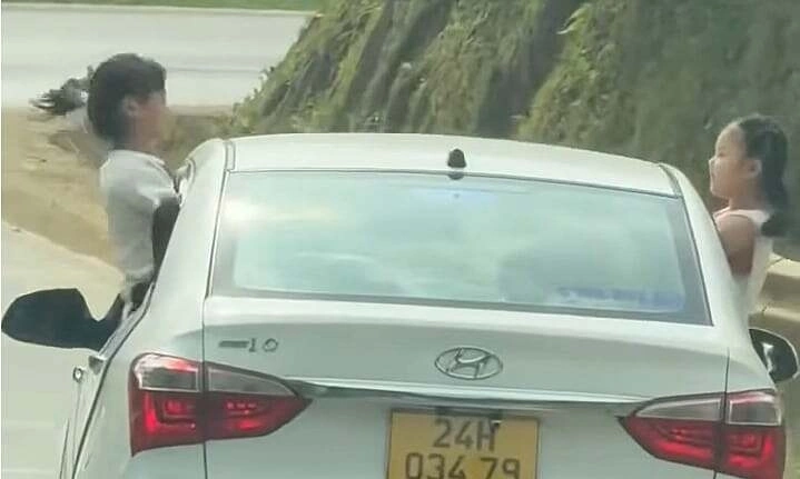 How are children sticking their bodies out of car windows penalized?