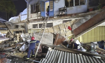 Three trapped as collapsed house blocks escape