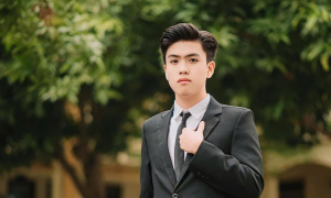 National math olympic valedictorian writes books, teaches early