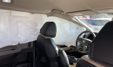Airbags deploy unexpectedly when vehicle drives over potholes