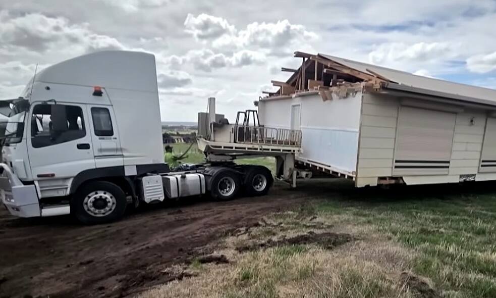 House crane-lifted and relocated after being built on neighbor's land