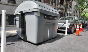 New York installs high-tech bins, replacing thousands of parking spaces
