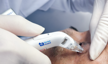 Treating eye bags for a man