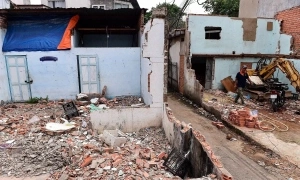 Sister to pay 280 million VND for encroaching on 15 square meters of sibling's land, avoiding demolition