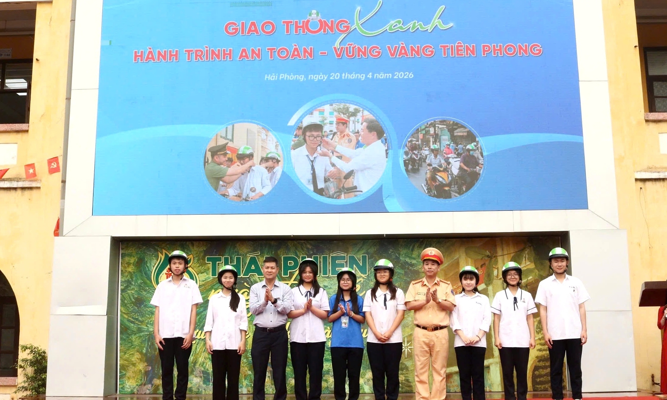 Donating 10,000 helmets to students and workers