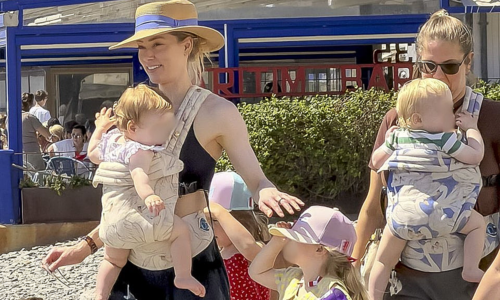 Amber Heard enjoys vacation with her three children