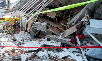 Demolition work collapses bakery, damages residential homes