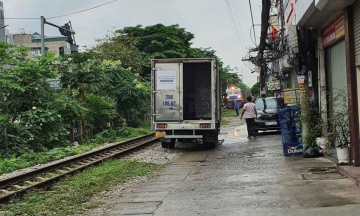 Train makes emergency stop, waits for car to leave safety corridor