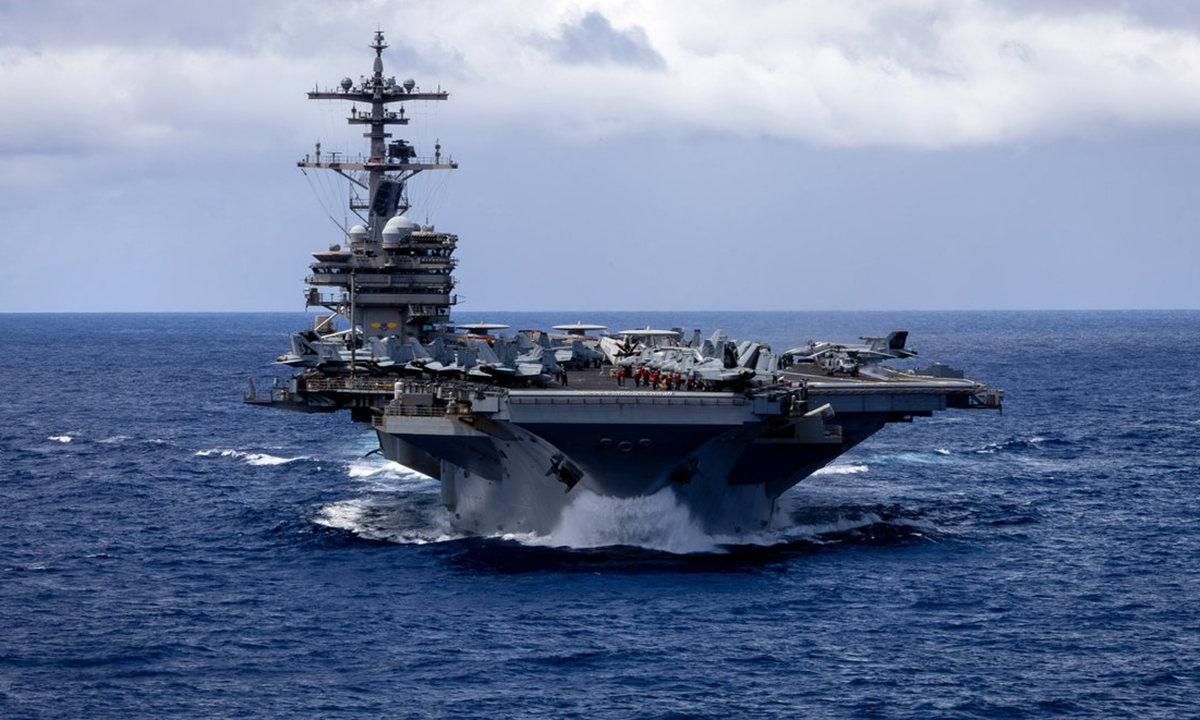 Third US aircraft carrier approaches Iran
