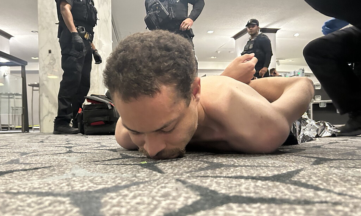 Moment gunman attempted to storm party with Trump