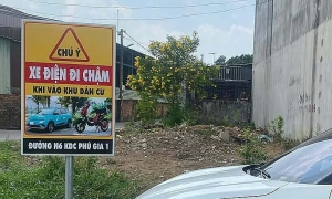 Residential area warns electric vehicles to slow down