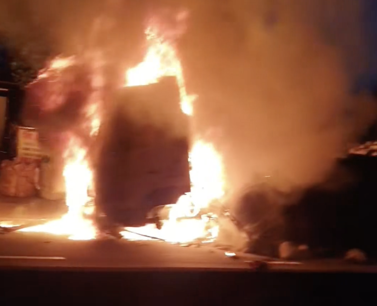 Tractor-trailer engulfed in flames on road to Cat Lai Port