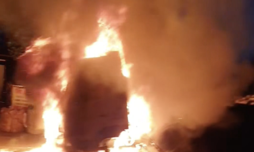 Tractor-trailer engulfed in flames on road to Cat Lai Port