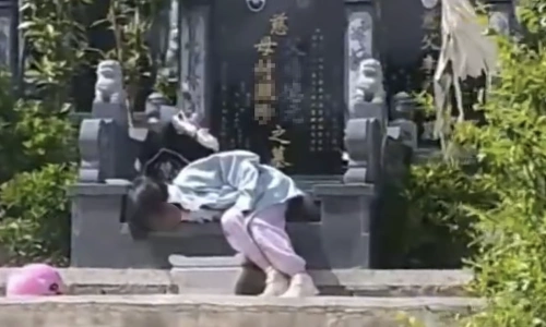 The story behind a young girl wanting to sleep by her grandparents' graves
