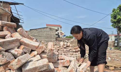 Residents voluntarily demolish homes, cut trees to widen national highway 6